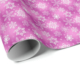 vit snöflingor på rosa presentpapper