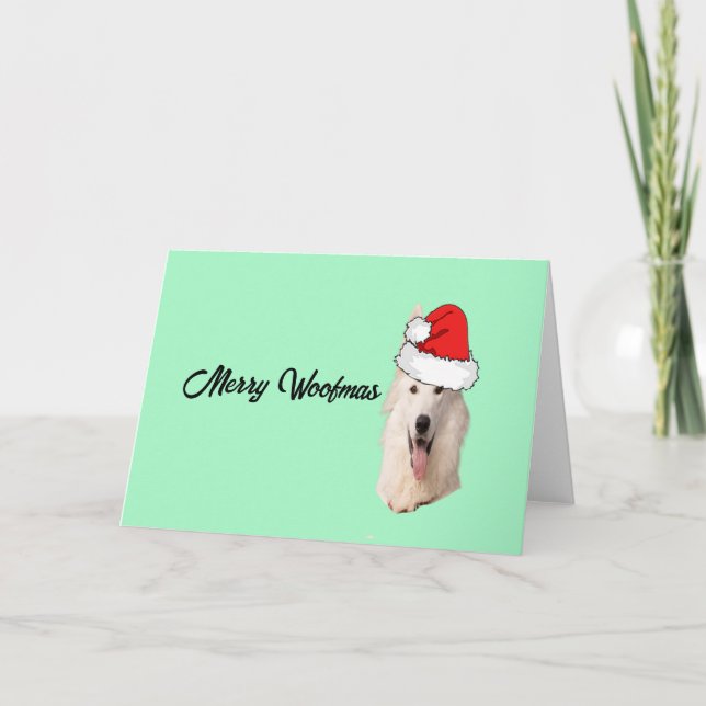 Vit tysk schäferhund med en tomtehatt  helgkort (Framsida)