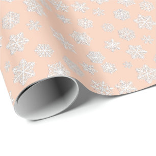 Vita 3D-snöflingor på persikofärgad bakgrund Presentpapper