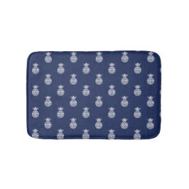 Vita ananas på marinblått badrumsmatta