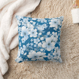 vita blommor mönster, blå bakgrund, kudde