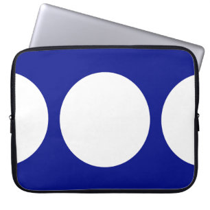 Vita cirklar på blå laptop sleeve