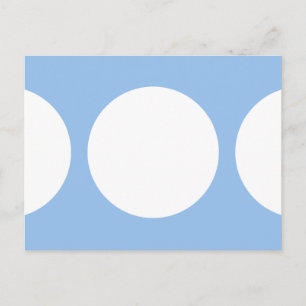 Vita cirklar på ljusblått vykort