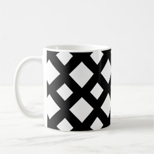 Vita diamanter på svart kaffemugg