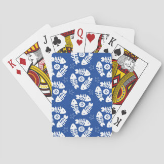 Vita fiskben och sanddollarblå casinokort