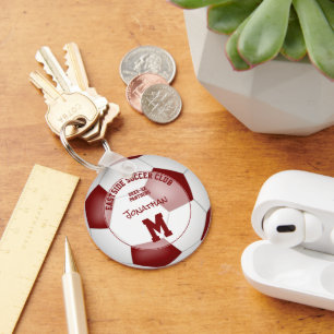 Vita fotbolls-lag ger barn sport nyckelring