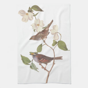 Vita halmstrå ungfåglar med rött ljus med blommor kökshandduk
