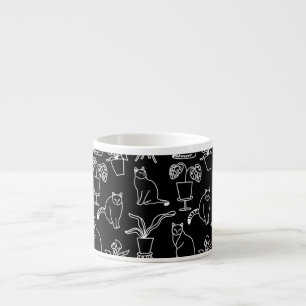 Vita katter i svart espressomugg