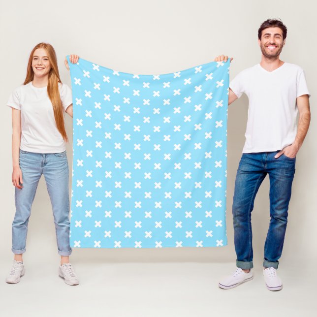 Vita kor stygn på baby blue fleecefilt (På plats)