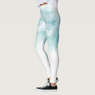 Vita leggings har en mjuk akvarelldesign