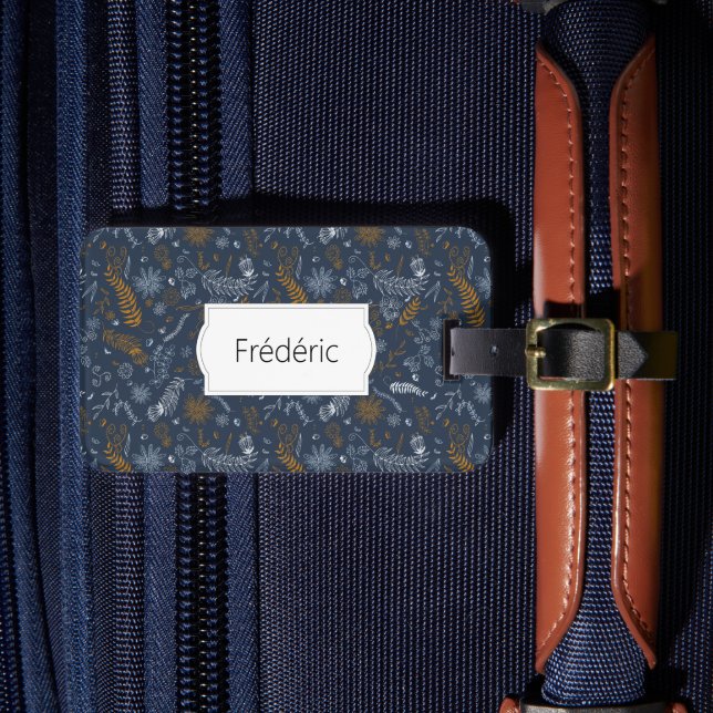 Vita och gyllene blommigtar i blått bagagebricka (Framsida Insitu 4)