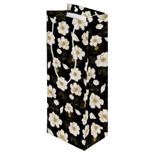 Vita och gyllene blommor på svart