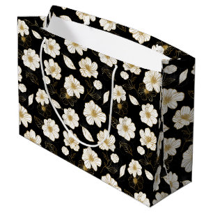 Vita och gyllene blommor svarta