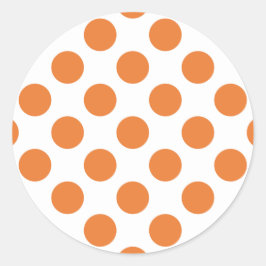 Vita och orange prickar runt klistermärke