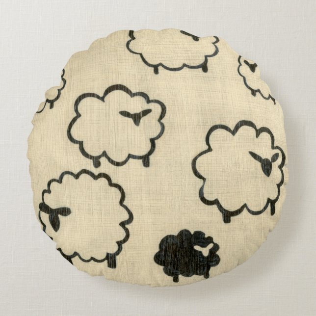 Vita och svarta får på Cream-bakgrunden Rund Kudde (Framsidan)