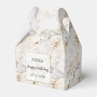 Vita orkidéer på lätt grädde presentaskar