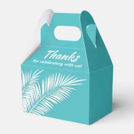 Vita palmblad på turkosa presentaskar för kalas