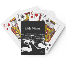 Vita persikor på svarta klassiska spelkort