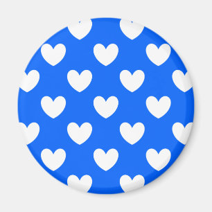 Vita polka-hjärtan på blått magnet