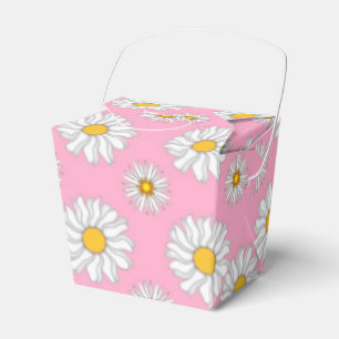 Vita prästkragar på het rosa presentask