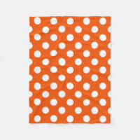 Vita prickar på orange