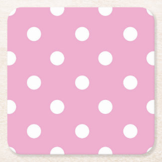 Vita prickar på rosa underlägg papper kvadrat