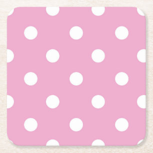 Vita prickar på rosa underlägg papper kvadrat