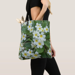 Vita primula blommor tygkasse