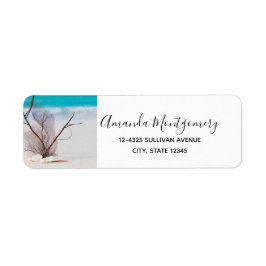 Vita Seashells på en tropisk strand Returadress Etikett