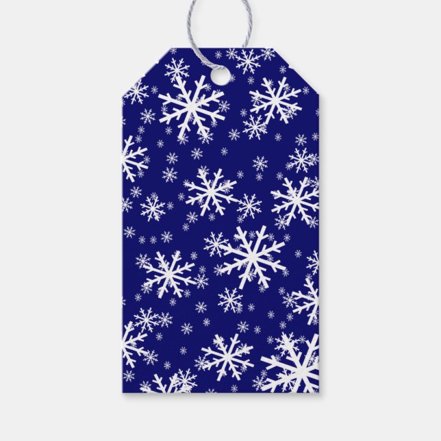 Vita snöflingor på mörkblått presentetikett (Framsidan)