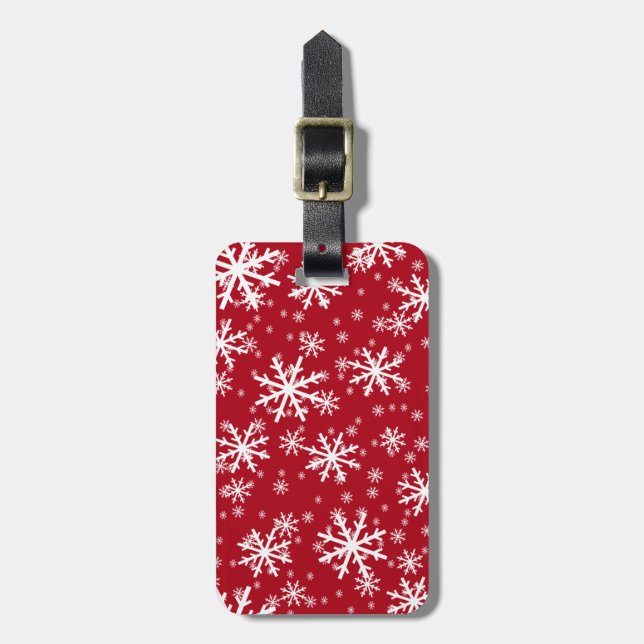 Vita snöflingor på mörkröd bagagebricka (Vertikal Framsida)