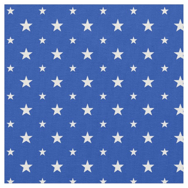 Vita stjärnor på blå tyg (Närbild)