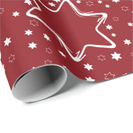 Vita stjärnor på röd jul presentpapper