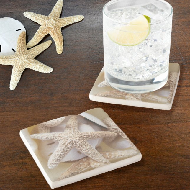 Vita stjärtfenor och sanddollar stenunderlägg (Skapare uppladdad)