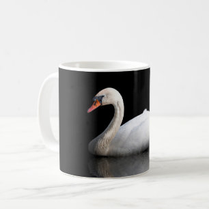 Vita svan på svart kaffemugg