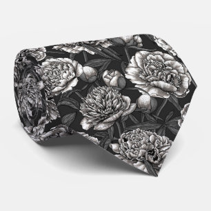 Vitblommor på mörk grått slips