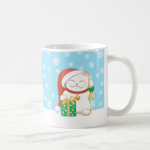 Vitjulkatt i en röd hatt kaffemugg