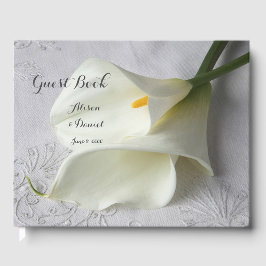 Vitkalla lilies på linen gästböcker