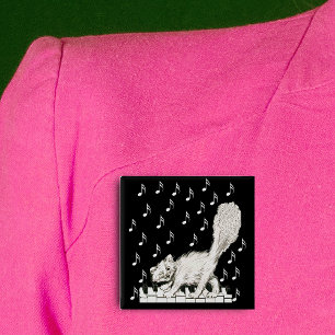 Vitkatt på Piano Nycklar Knapp