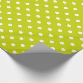 Vitpolka dots på limefruktgrönt presentpapper