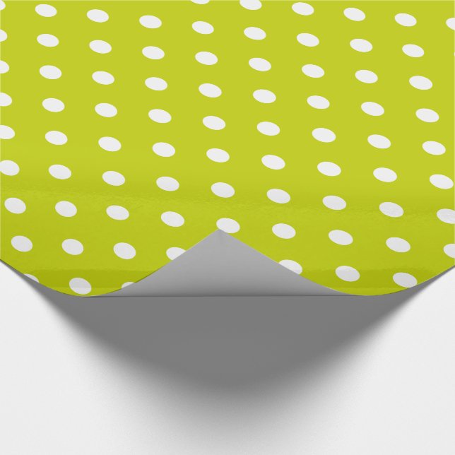 Vitpolka dots på limefruktgrönt presentpapper (Hörn)