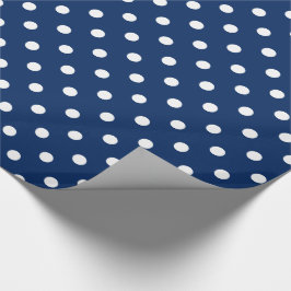 Vitpolka dots på marinblått presentpapper