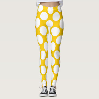 Vitpolka dots som är stor på Tangerinegultorangen Leggings