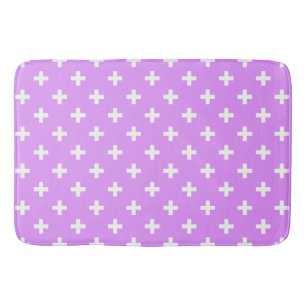 Vitpolka kor på lilac badrumsmatta
