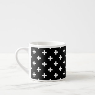 Vitpolka kor på svart espressomugg