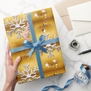 Vitsnöflingor på guld- jul presentpapper