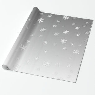 Vitsnöflingor på silver presentpapper