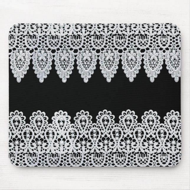 Vitsnöre bildar en delikat gräns mot svart musmatta (Framsidan)