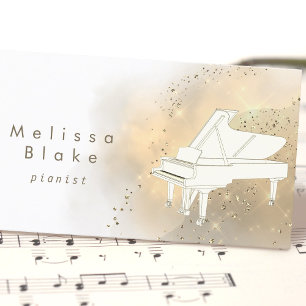 Vitt piano golden dust visitkort