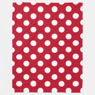 Vitt polka dots på rött fleecefilt